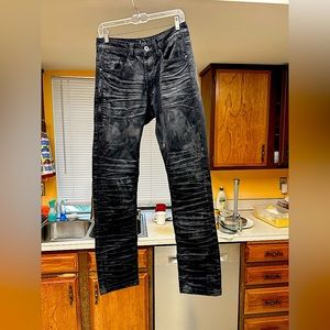 Like new, Men’s Buckle R Sole skinny black coated waxed illusion 29X32 size